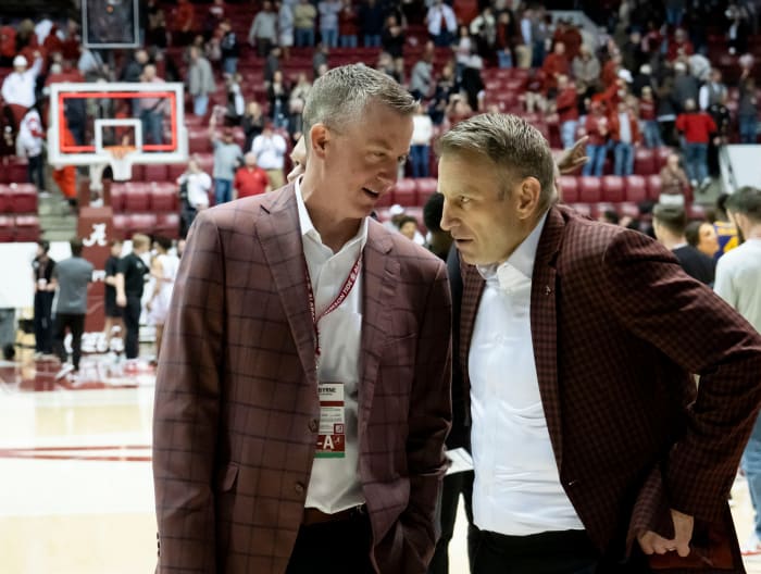 Athletic Director Greg Byrne talks to Alabama head coach Nate Oats after the Crimson Tide s win over LSU at Coleman Coliseum Saturday. Alabama defeated LSU 106-66. Ncaa Basketball Alabama Vs LSU